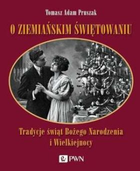 Obejmująca się para przy choince. na okładce książki pt. "O ziemiańskim świętowaniu".