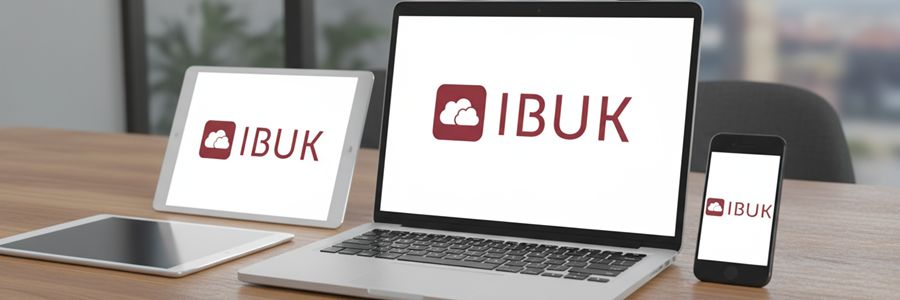 Laptop, smartfon i tablet na biurku wyświetlają logo IBUK.