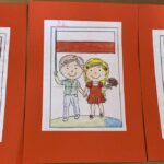 Kolorowanki dziecięce - dziewczynka i chłopiec z flagą narodową.