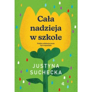 Żółty tulipan na zielonym tle.